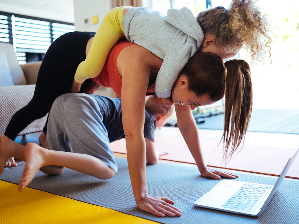Children working out at home with mum