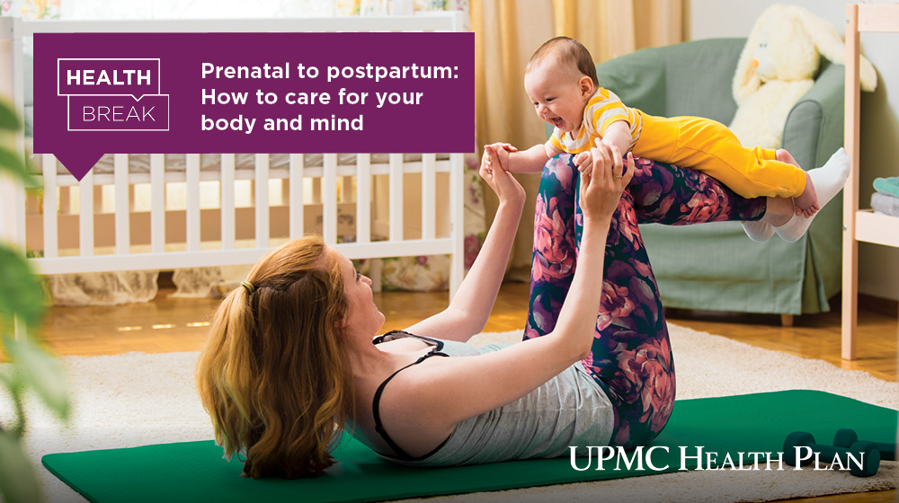 A mom plays with their baby on a yoga mat